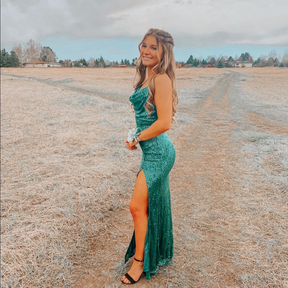 Green sequin slit prom dress